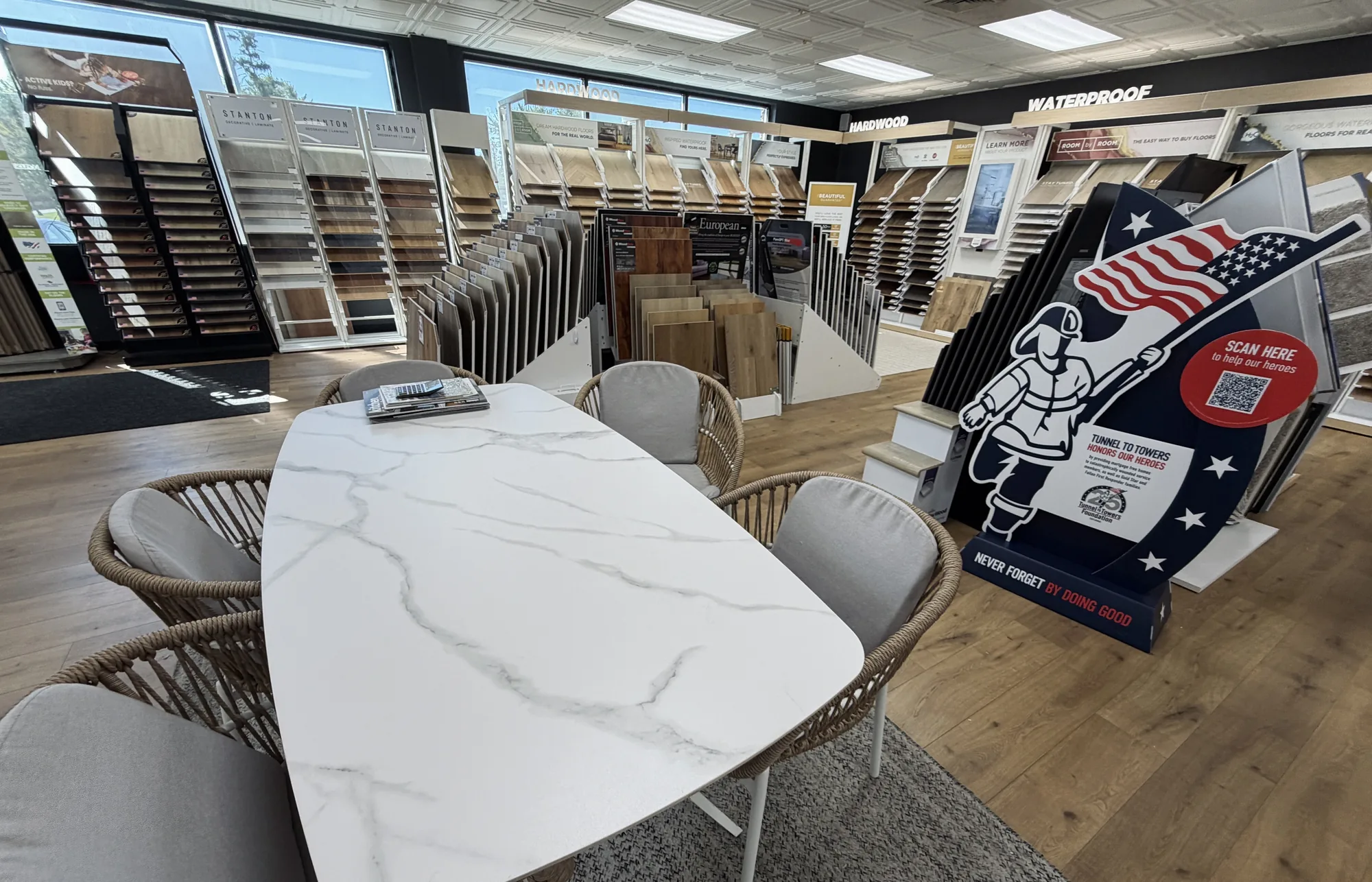 Madison Floor & Bath showroom in Tonawanda, NY with wood-look flooring and product sample displays