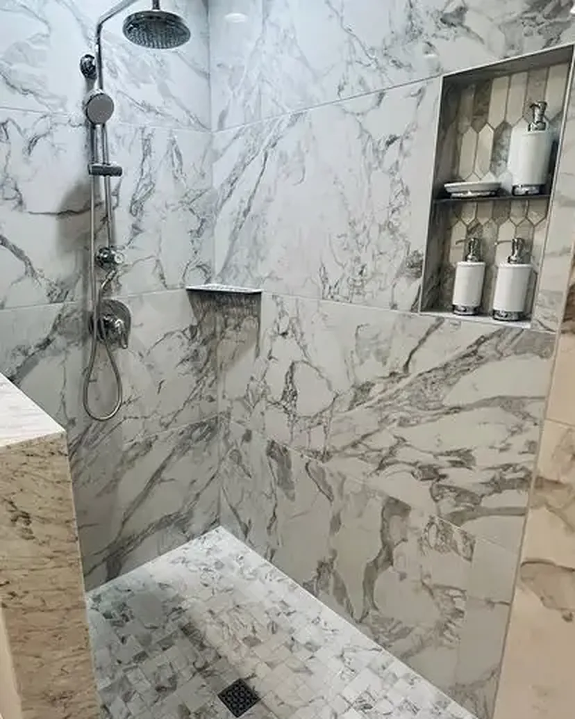 Marble-look tile walk-in shower from Madison’s existing website